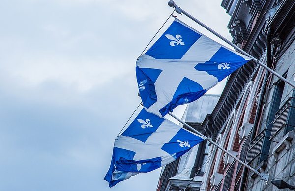 Quebecers narrowly vote No to sovereignty, 50.6% to 49.4%, October 30