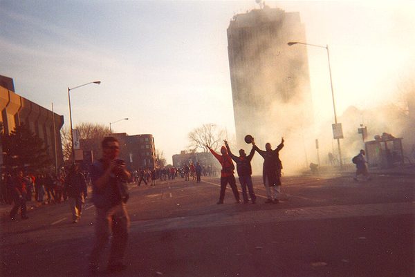 The Summit of the Americas in Quebec City draws mass anti-globalization protests behind a 3-metre security fence (April 2001)