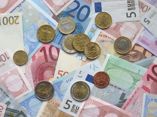 Euro banknotes and coins enter circulation