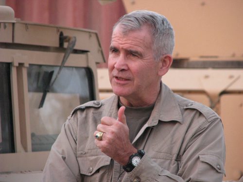 Iran-Contra hearings grip the nation; Oliver North testifies