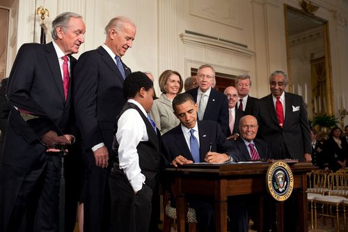 Affordable Care Act signed into law by President Obama
